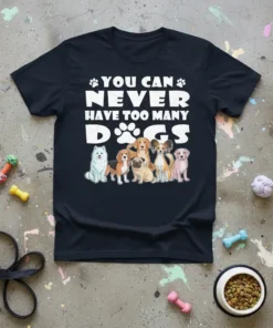T-shirt with white text "You Can Never Have Too Many Dogs" above a line of cartoon dog breeds including a
