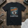 You Can't Scare Me I Have 3 Daughters text design on a black t-shirt with shield graphic