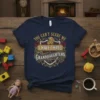 You Can't Scare Me I Have Three Granddaughters text design with lion graphic and ornate border on a navy t-shirt