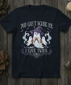 You Can't Scare Me I Have Twins Halloween ghost design on a dark t-shirt. Features a witch ghost with pumpkin