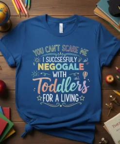 You Can't Scare Me I Succsesfully Negogale With Toddlers For A Living quote t-shirt with colorful typography and playful graphics