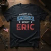 Patriotic t-shirt with text "YOU CAN'T SPELL AMERICA WITHOUT ERIC" in distressed red and blue lettering