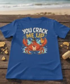 You Crack Me Up crab t-shirt design with a cartoon crab holding a chicken, funny seafood pun graphic