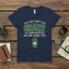 Navy t-shirt with the text "You Don't Have To Be Crazy To Camp With Us. We Can Train You" and