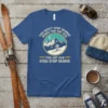 Vintage skiing quote t-shirt: "You Don't Stop Skiing When You Get Old." Features a mountain scene with a skier