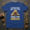 YOU GOT A DOG? WELL THAT'S CUTE I RAISE A TINY DINOSAUR text with a bearded dragon graphic on a