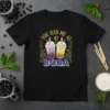 Black t-shirt with "You Had Me At Boba" text and two cartoon bubble tea cups, one purple and one yellow