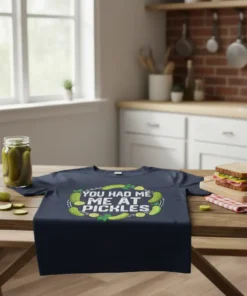 T-shirt with "You Had Me At Pickles" text surrounded by pickle graphics