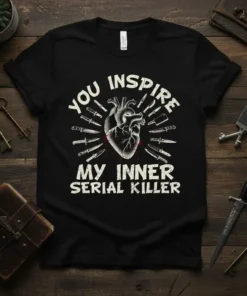Black t-shirt with white text "You Inspire My Inner Serial Killer" and a graphic of a human heart surrounded by