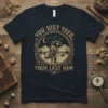 Graphic t-shirt with the phrase "YOU JUST YEED YOUR LAST HAW" and a raccoon wearing a cowboy hat and boots
