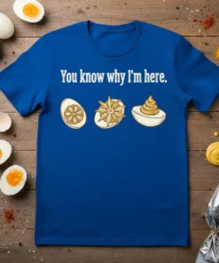 Blue t-shirt with "You know why I'm here." text and illustrations of decorative deviled eggs