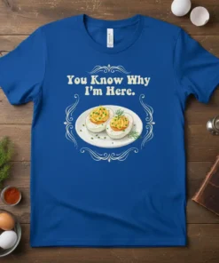 Blue t-shirt with "You Know Why I'm Here." text above a graphic of two deviled eggs in a decorative frame