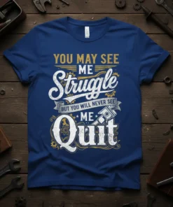 You May See Me Struggle But You Will Never See Me Quit quote on a blue t-shirt with distressed typography
