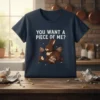 "You Want A Piece Of Me? Happy Easter" text with a chocolate bunny and eggs graphic on a navy t-shirt