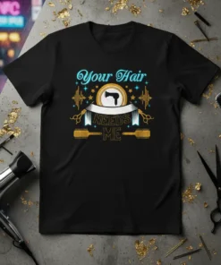 Black t-shirt with "Your Hair NEEDS ME" text and graphics of scissors, combs, and a hairdryer