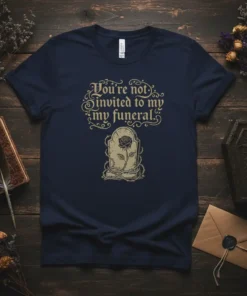 Navy t-shirt with gold text "You're not invited to my funeral" and a tombstone with a rose graphic