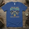 You've Just Buttered Your Last Biscuit funny western quote t-shirt with crossed guns and cowboy hats