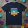 Zen Pop It Fidget Toy T-Shirt featuring a smiling, meditative Pop It toy in rainbow colors