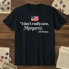 "I don't really care, Margaret." JD Vance quote t-shirt with American flag graphic and white text
