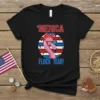 'Merica Flock Yeah! text with a patriotic flamingo wearing sunglasses and a bandana on a black t-shirt
