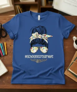 T-shirt with #schoolsecretarylife hashtag, messy bun, and sunglasses filled with school supplies