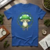 Cute U × I mushroom character design with a green cap and vines, on a blue t-shirt